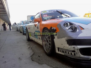 997 GT3 Cup cars in paddock after race 1. Damage can be seen on the first car